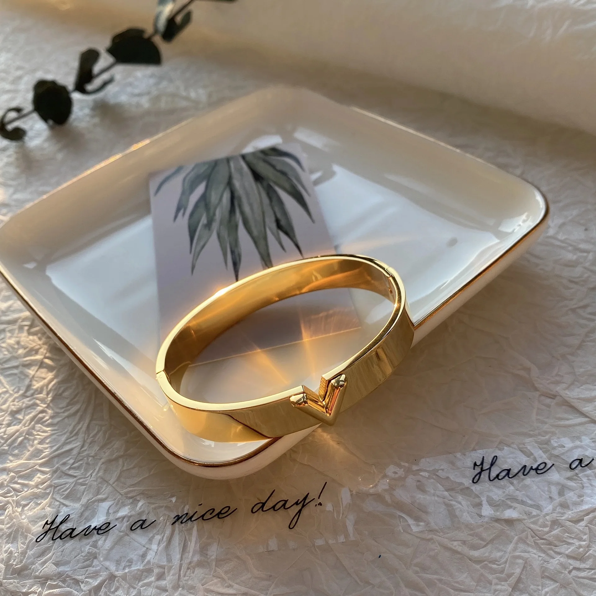 

European and American style titanium steel 18K wide face women's simple V-shaped bracelet