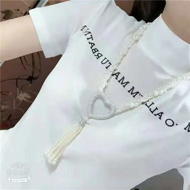 

Hand knotted white distorted natural freshwater pearl peach heart micro inlay zircon tassel sweater chain necklace 74-76cm