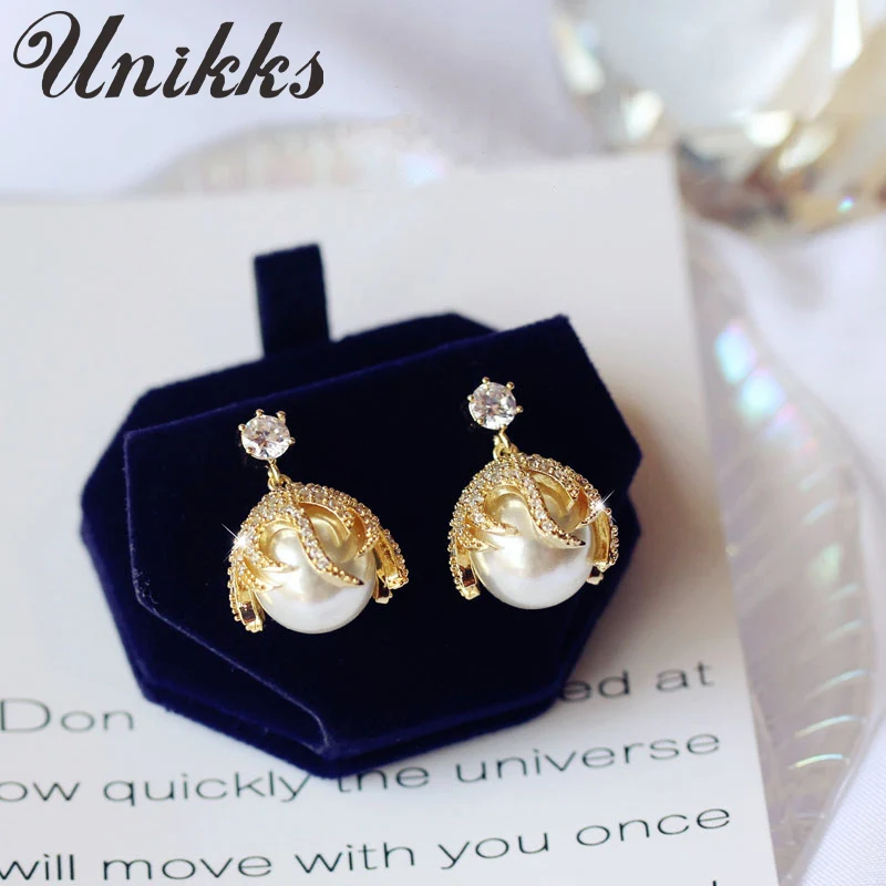 

French pearl and micro diamonds, high-quality golden flame-shaped thick earrings, female light luxury earrings, Japanese and Kor