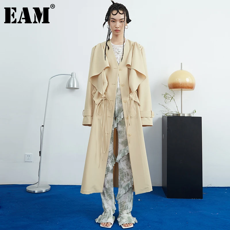 

[EAM] Women Yellow Ruffles Hollow Out Drawstring Trench New Lapel Long Sleeve Windbreaker Fashion Spring Autumn 2022 1DD7061