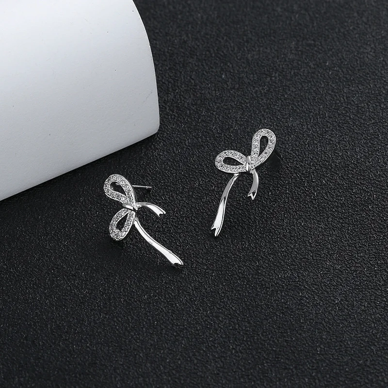 

Ribbon bow earrings female spring and summer design Korean net red fairy style gentle temperament long earrings Wholesale