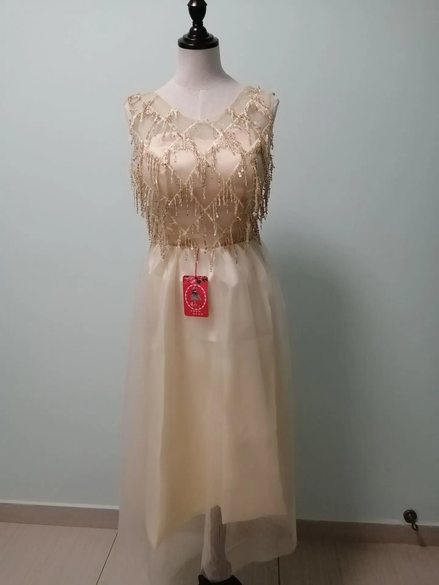 

KAUNISSINA Sequined Cocktail Dresses Sleeveless Sequins Tassel O-neck Party Dress Sexy Tull Plus Size Knee Length Formal Gowns