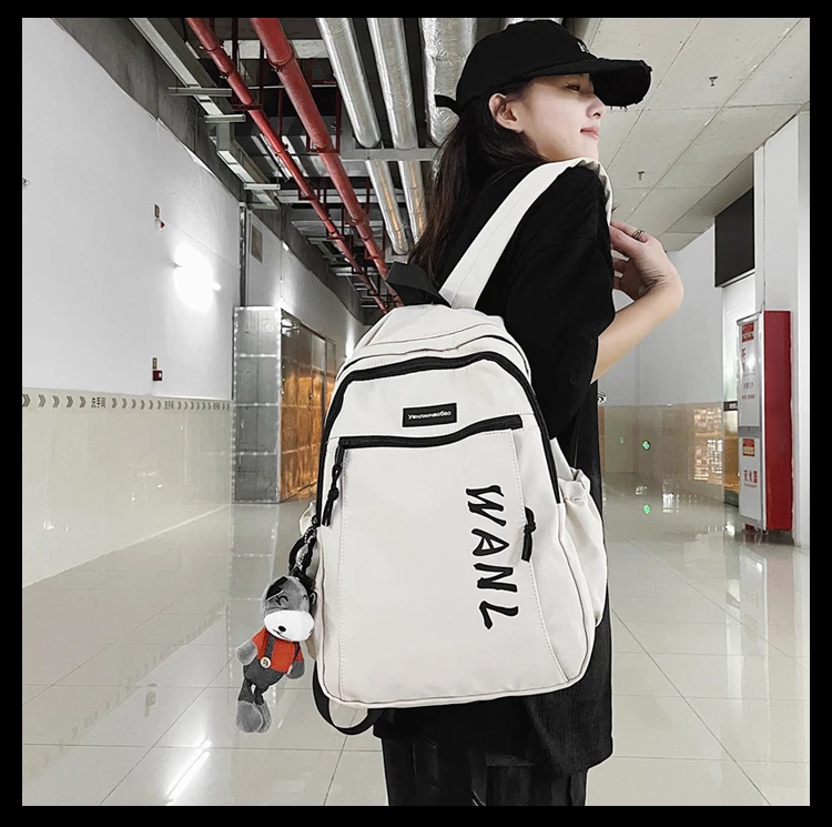 

4262 students' simple and high-value schoolbag female summer niche design large-capacity solid color backpack