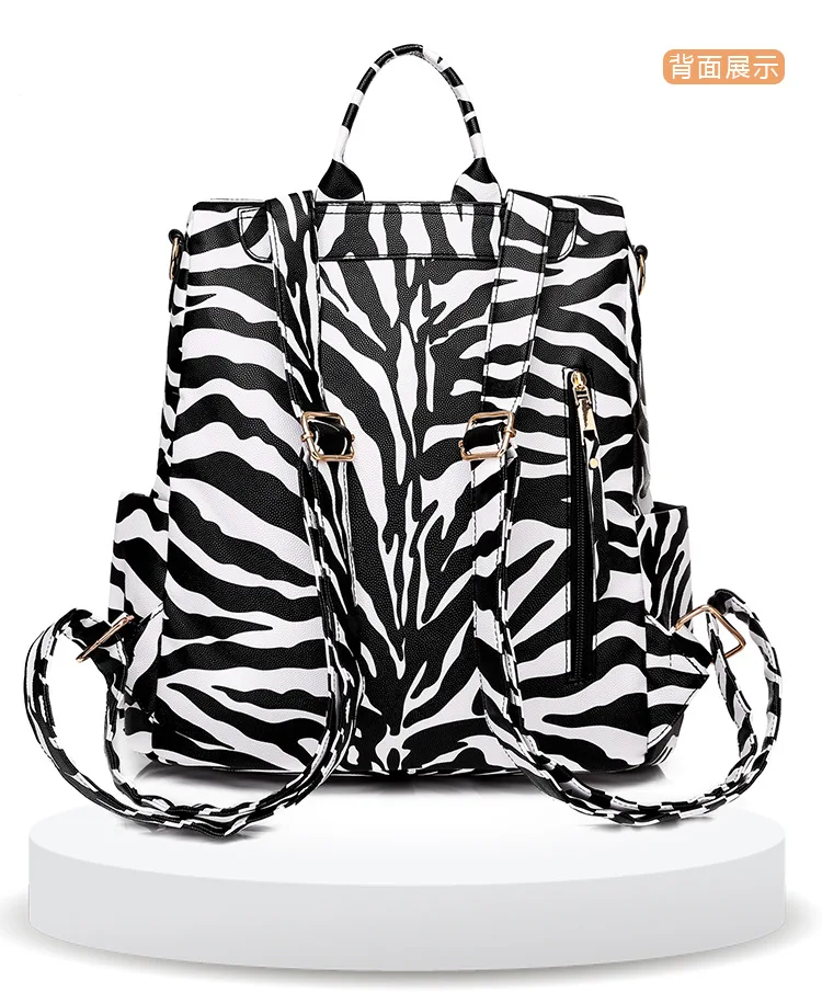 

2021 Female Cow Print Convertible Backpack Fashion Shoulder Tote Women's Bag With Guitar Strap Multifunction Travel Bags