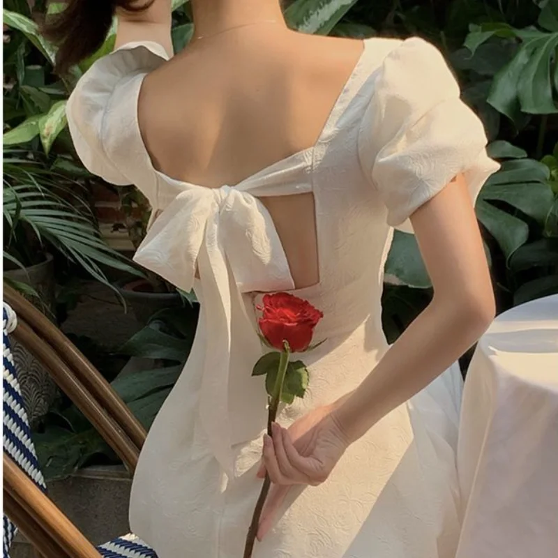 

Vintage Fairy Dress Women Elegant Bow White Party Dress Designer Puff Sleeve V-neck Hollow Out Midi Dress Female Causal Clothing