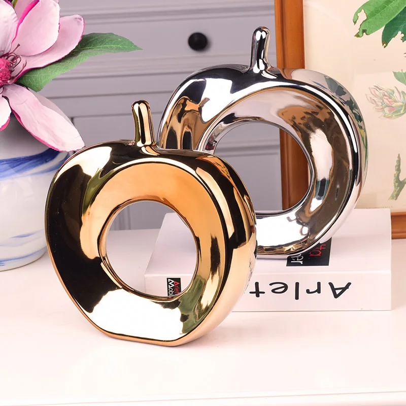 В абстрактном керамическая с гальваническим покрытием яблоко рукоделия