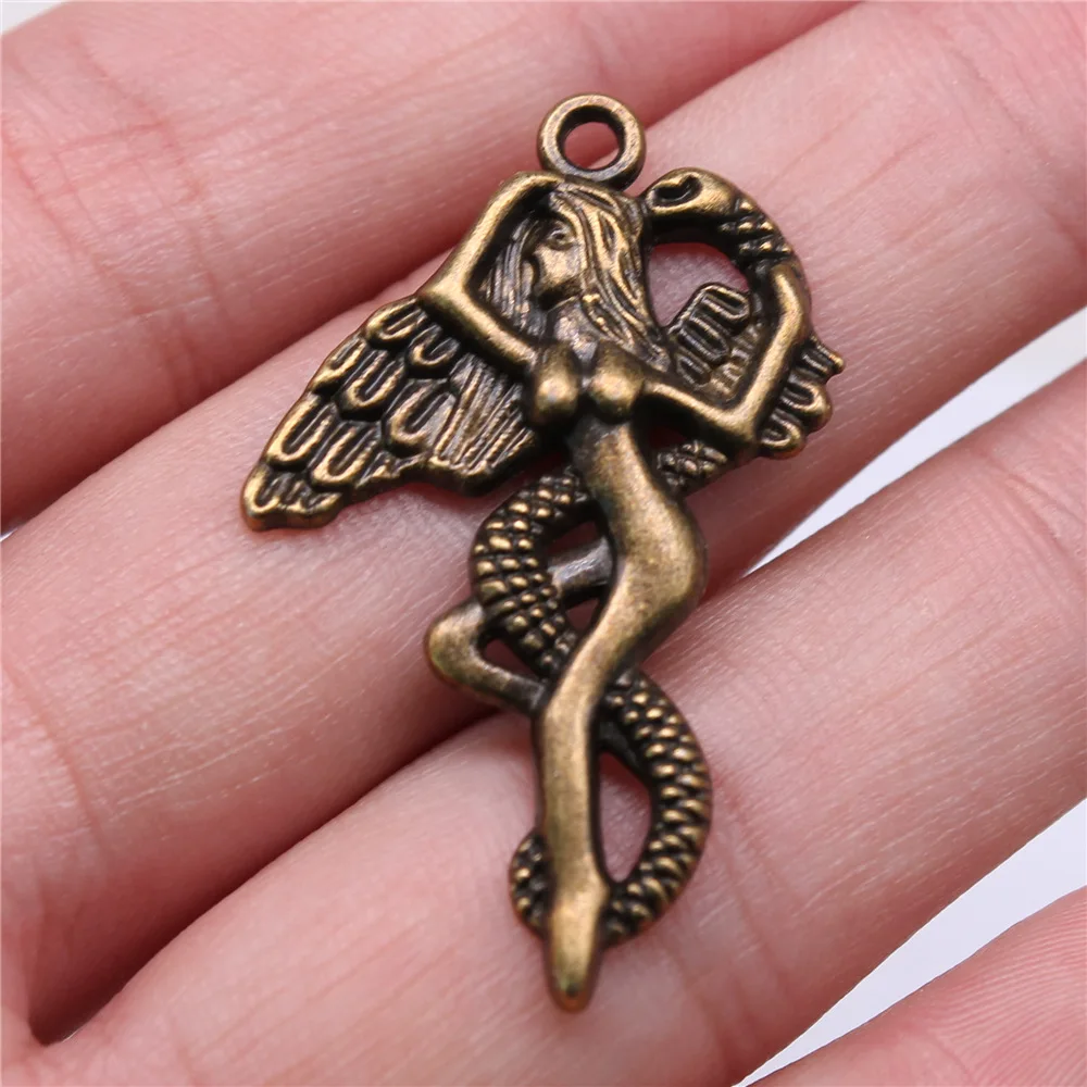 

10pcs 40x26mm Antique Bronze Color Eve And Snake Charms For Jewelry Making A13038