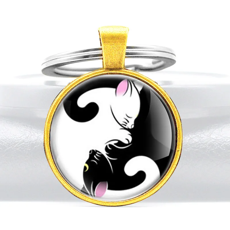 

Mysterious Black White Cat Design Glass Cabochon Metal Pendant Key Chain Classic Men Women Key Ring Accessories Keychains Gifts