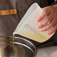 60 dropshipping500ml household measuring cup environmentally friendly heat resistant silicone non stick measuring cup supplie