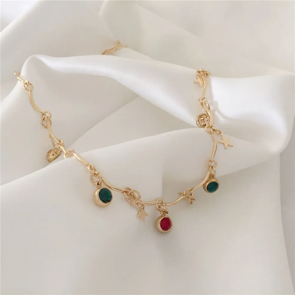 Цепочка-чокер акриловая в стиле бохо золотого цвета с подвеской виде звезды для