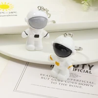 2pcs creative cute cartoon astronaut keychain metal key chain for women bag charm pendant key ring gifts jewelry childrens toys