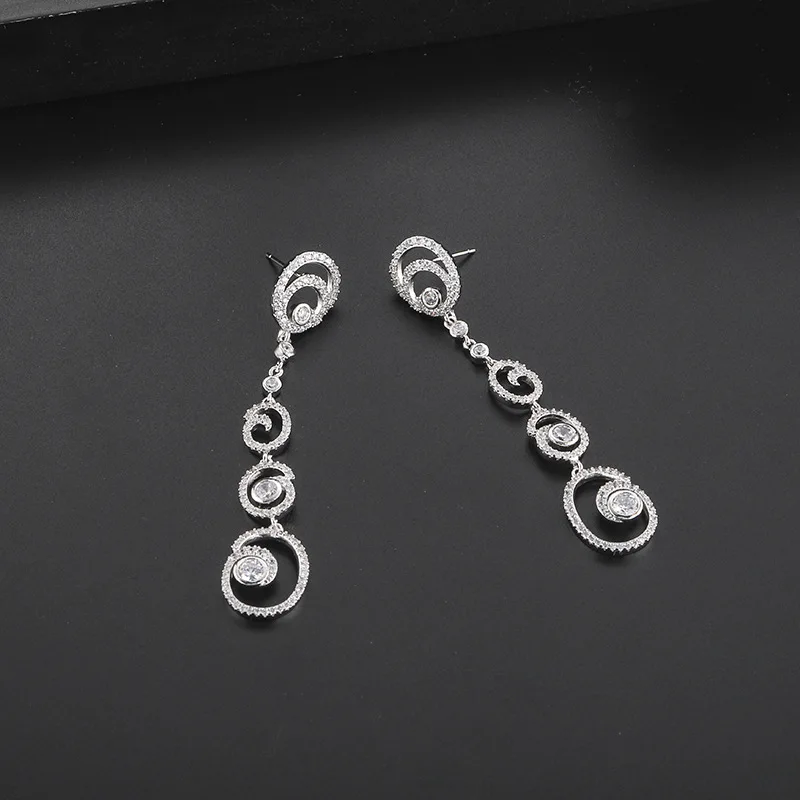 

Earrings, earrings, European and beautiful earrings, exaggerated copper inlay jewelry earrings, happy knots, wild earrings, fact