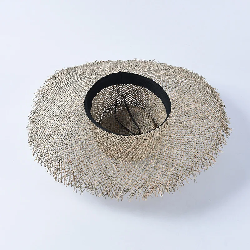 

Spring and summer hat ladies Europe fashion large eaves sunshade hat women hollowed-out straw hat beach vacation straw hat