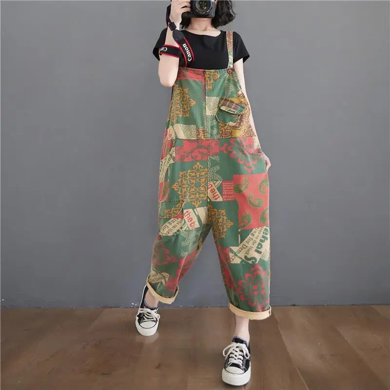 

Korean version 2021 spring new personalized loose printing casual one-piece pants straight tube wide leg strap pants cropped