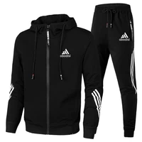 2021 new spring and autumn brand fashion mens two piece striped sportswear hooded outdoor sports pants track and field suit
