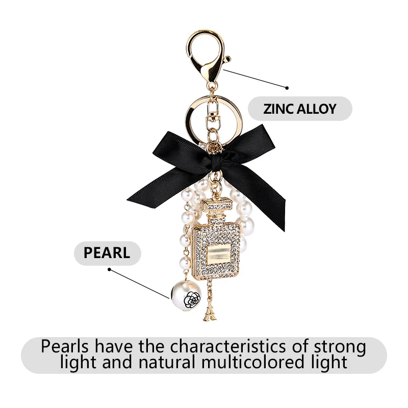 Creative hand-studded perfume bottle alloy key chain charm bow pearl pendant ladies bag mobile phone case pendant Birthday Gift