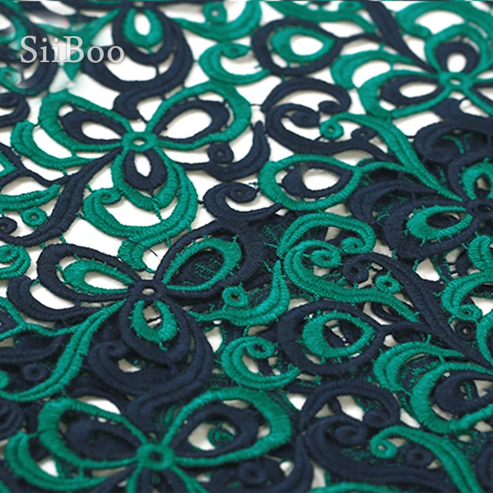 Дизайнерское темно зеленое объемное гипюровое кружевное платье с цветочной