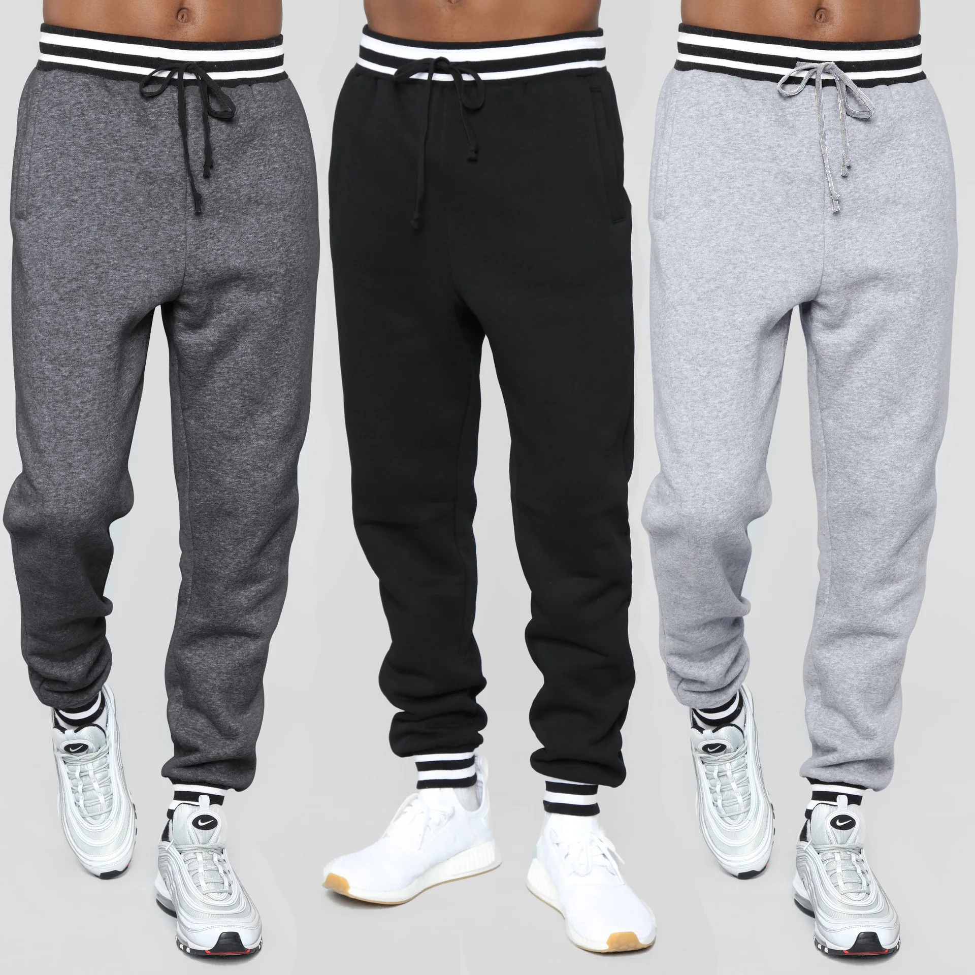 

Hot Sale Men Slim-fit Casual Sports Sweatpants Men Casual Solid Color Ankle Tied Pockets Drawstring Sports Long Pants Trousers