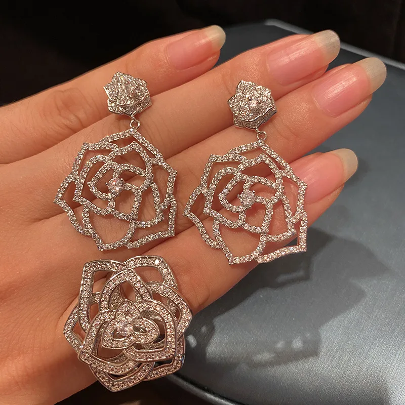 

Camellia ring female stereo flower fragrance elegant lady hollow camellia earrings luxury micro-inlaid zircon