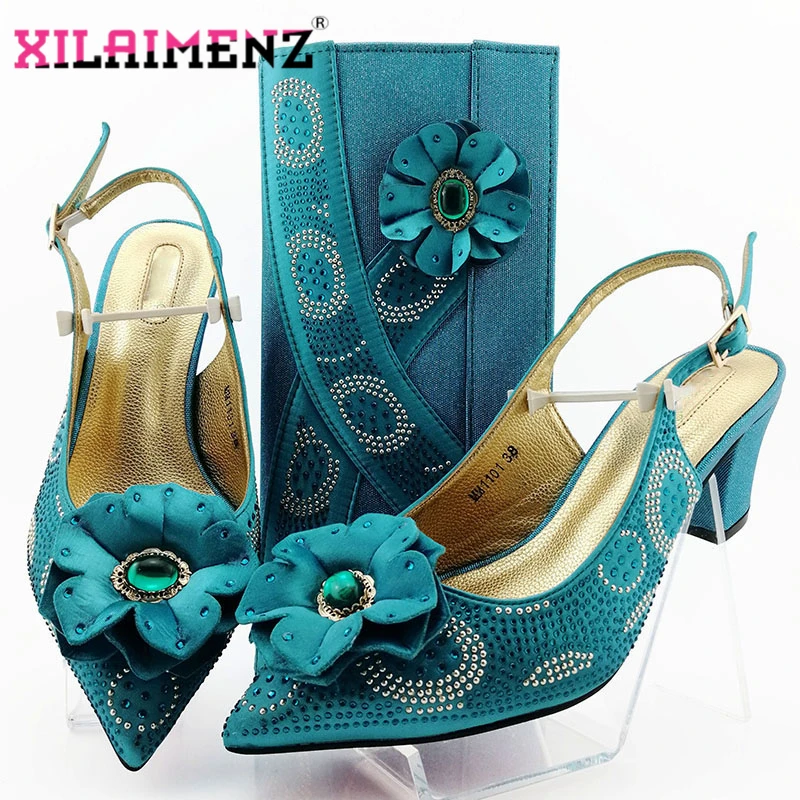 

Комплект для отдыха женская африканская обувь с подходящими сумочками Итальянские женские туфли и сумки наборы синих женских высоких санд...