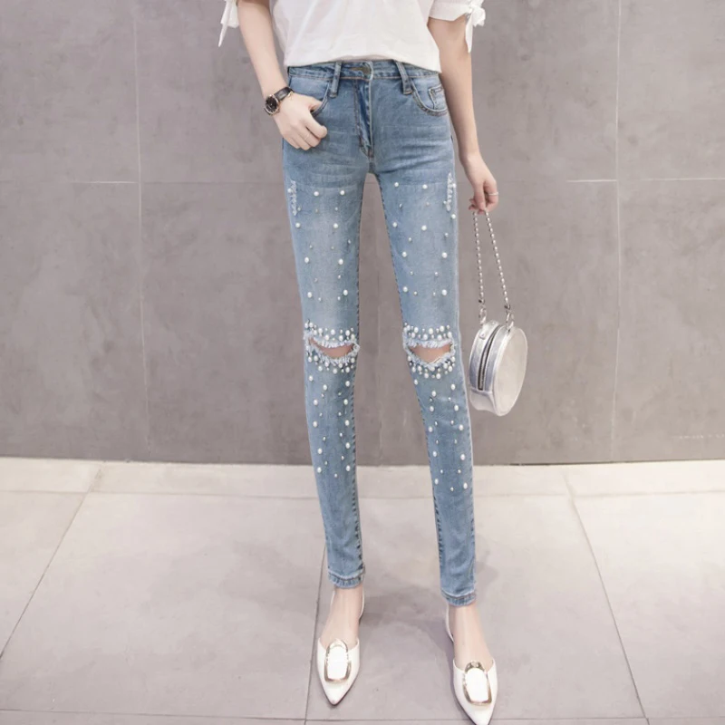 Женские джинсовые брюки с перламутровыми вставками повседневные рваные