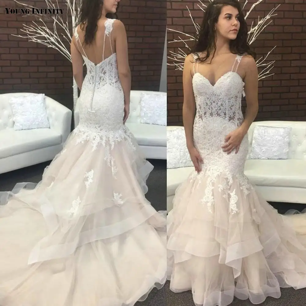 

Young Infinity Champagne Mermaid Wedding Dresses Spaghetti Backless Royal Train Appliques Illusion Bodice Appliques Bridal Gowns