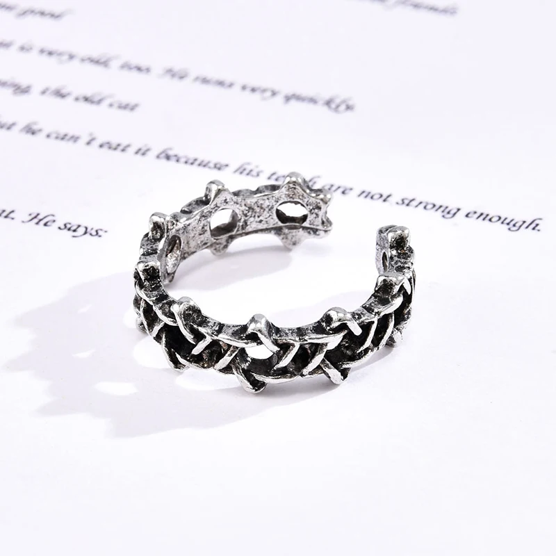 

Fashion simple style finger ring retro distressed six-pointed star hollow ring metal woven dark black female ring