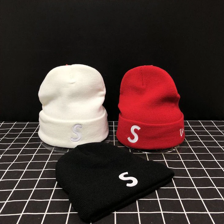 

Winter men's and women's hats thick knitted warmth Street brand S windproof and warm riding wool stitching knitted pullover cap