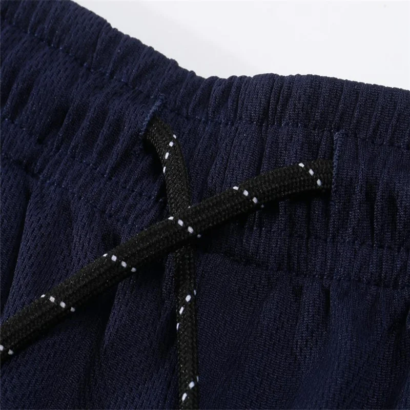 

2021 men's new mesh quick-drying breathable shorts summer new loose sports beach pants men's high-quality men's shorts S-3XL