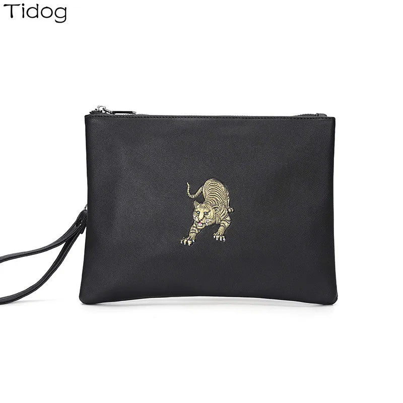 

Tidog Fashion street personality leather handbag clutch bag