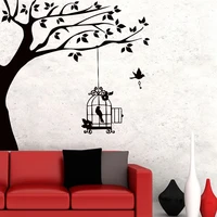 zooyoo a bird with key and cage hanging in the tree branch wall stickers vinyl wall art murals living room removable home decor