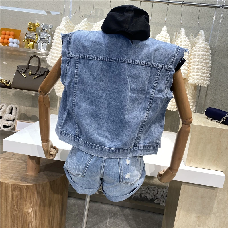 

New Brand Original Design 2021 Personalized Plush Sleeve Contrast Stitching Hole Sleeveless Denim Jacket With Loose Street Vest
