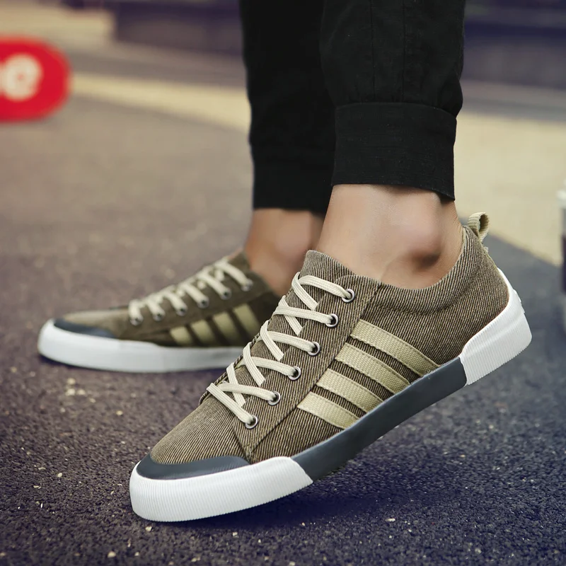 

2021 Fashion Men Canvas Shoes Solid Color Men Vulcanized Shoes Lace-up White Casual Sport Shoes Men Sneakers Tenis Masculino