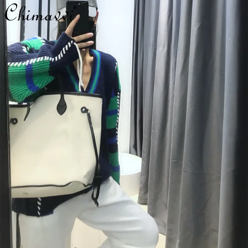 

Свитер с V-образным вырезом, осенняя одежда, новинка 2021, модный Свободный кардиган контрастной расцветки с бахромой, с пэчворком, утепленное ...