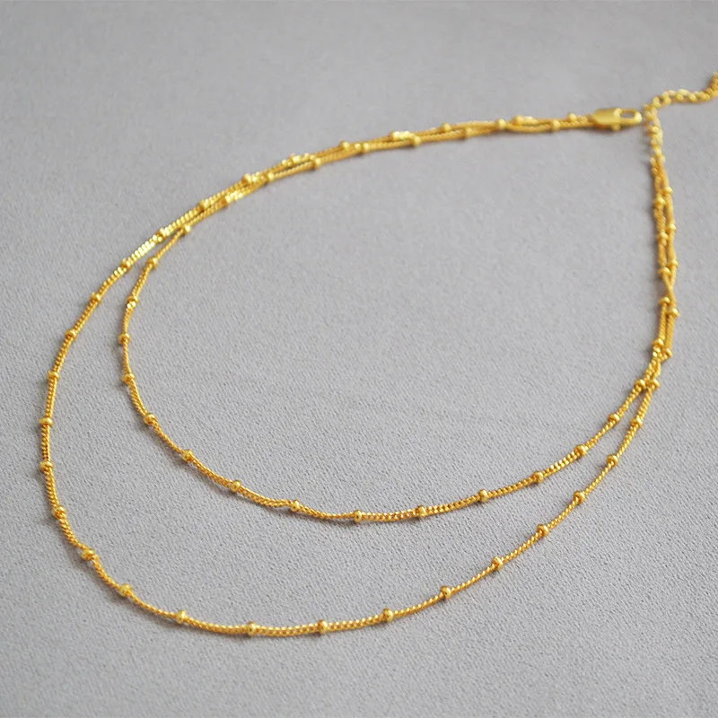 

Spain Super Fire Plated 18K Gold Simple and Versatile Temperament Double-Layer Peas Chain Necklace Simple Wholesale