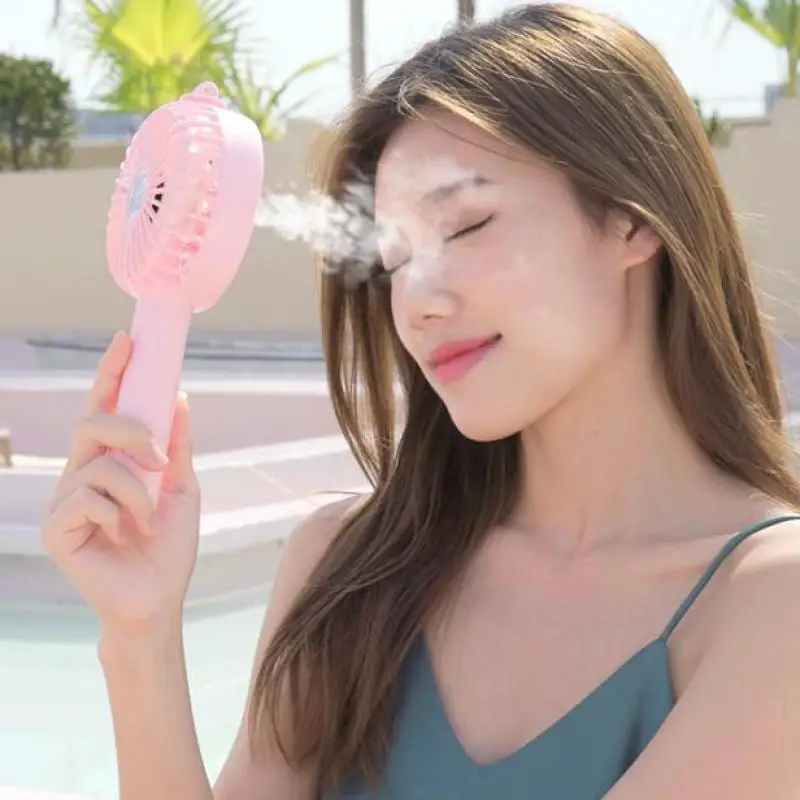 

Portable Fan Water Mist Mini Cooler Usb Small Fan 2000 mAh Cooling Face Fan Sprayer Steam Hand-held Fan Student Fan 2021