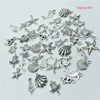 alloy 30pcs mixed batch tibetan silver starfish turtles shell dolphins tortoise hippocampus charm pendant jewellery wholesale