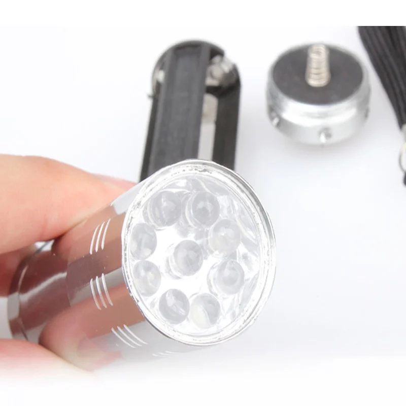 

Silver Alloy Mini Flashlight 9 LED Small Hand Torch Light Tools can CSV