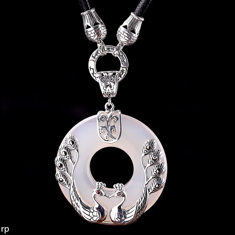 KJJEAXCMY Fine jewelry S925 Silver High Quality White Chalcedony Peacock Safety Buckle Pendant New