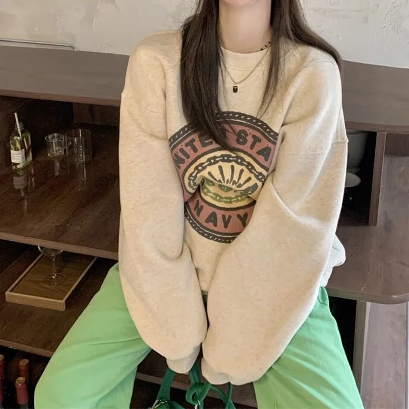 

Женский свободный свитер в американском стиле с длинным рукавом