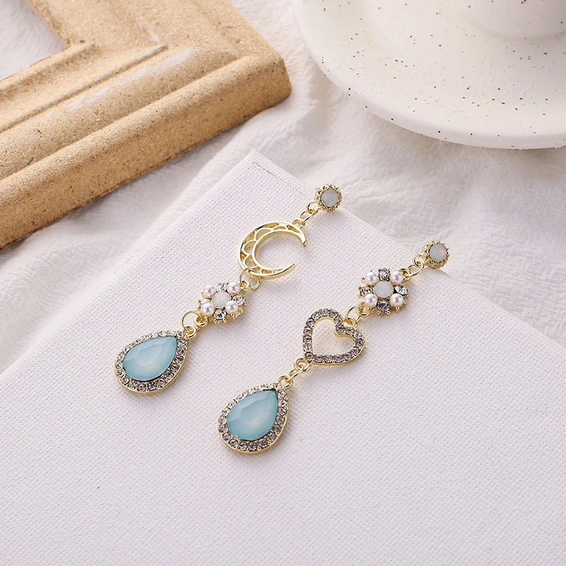 

Модные креативные серьги в форме Луны синего цвета с кристаллами для женщин серьги-капли в Корейском стиле модные красивые подарки Вечерни...