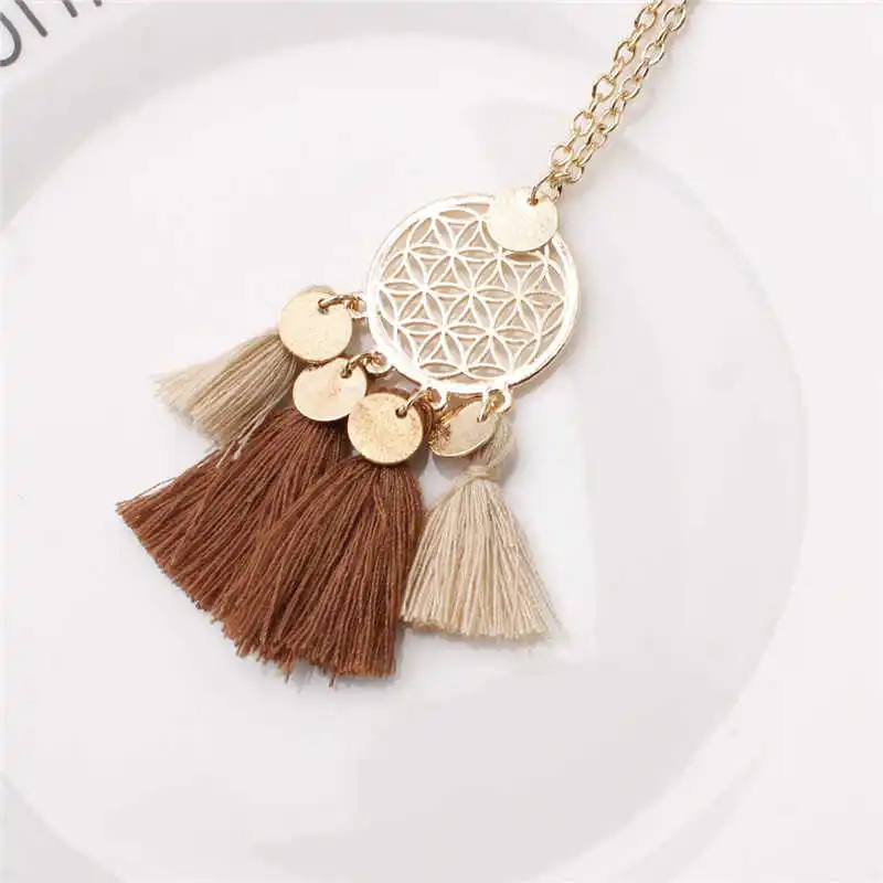 

New fashion women's tassel alloy necklace hollow out round long sweater Pendant