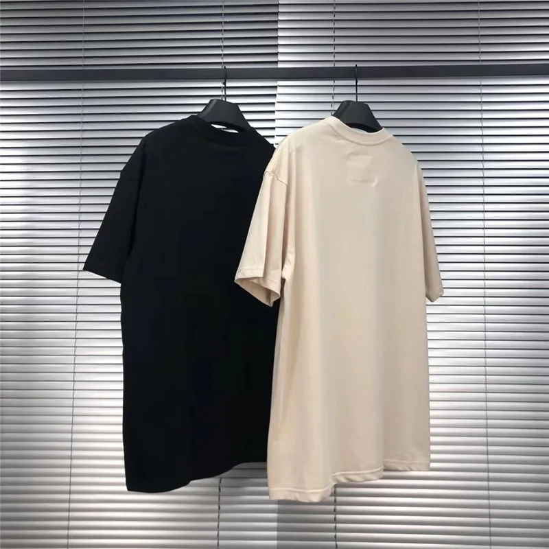 

Футболка абрикосового и черного цветов, размеры 1:1