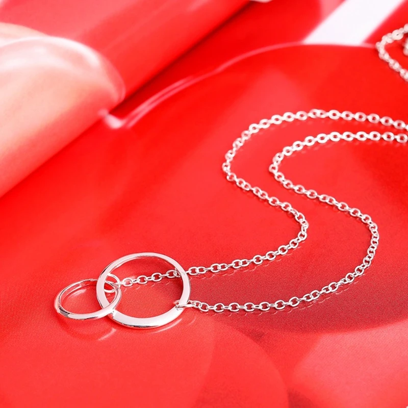 Асимметричная двойной круг с геометрическим круглым ожерелья упрощения в стиле