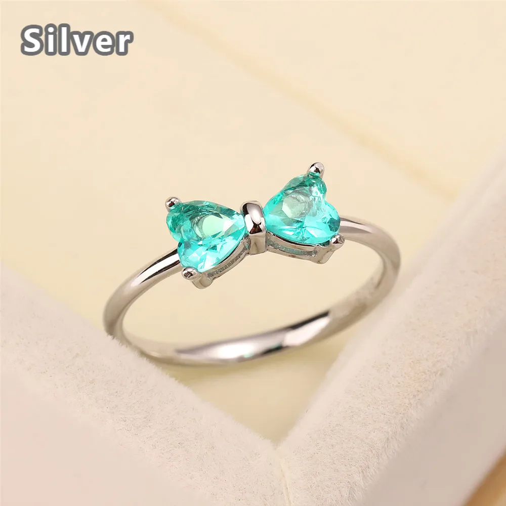 

Лучшие продажи в европейском и американском стиле; Мода S925 серебро светильник Изумрудное кольцо циркона с вышитым сердцем, с бантом, с украш...