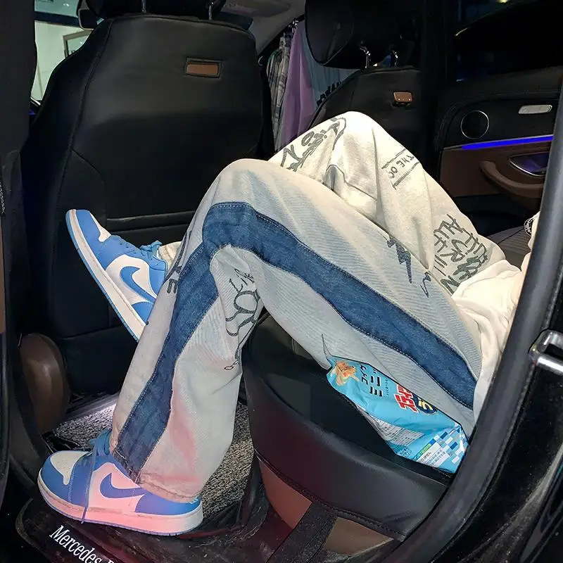 

2021 Fashion Individuality Graffiti Print Jean Men and Women Straight Stripe Denim Pant Man Hip hop Streetwear Trouser ripped