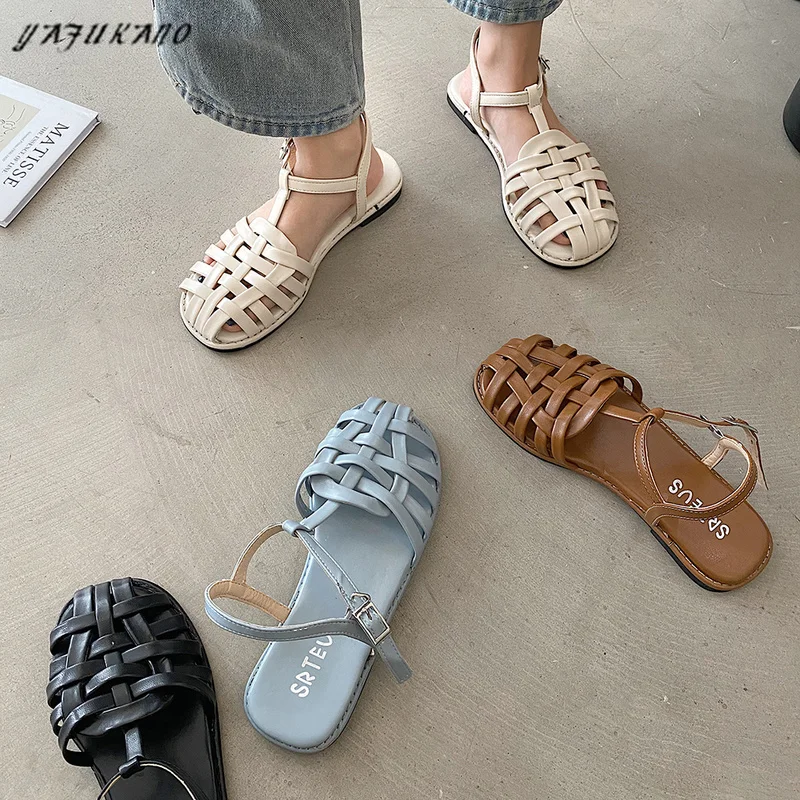 

Baotou Sandals Female Flat Casual Rome Shoes 2021 New Student Soft Sole Beach Fairy Style Hollow Woven Retro Gladiator Sandalias
