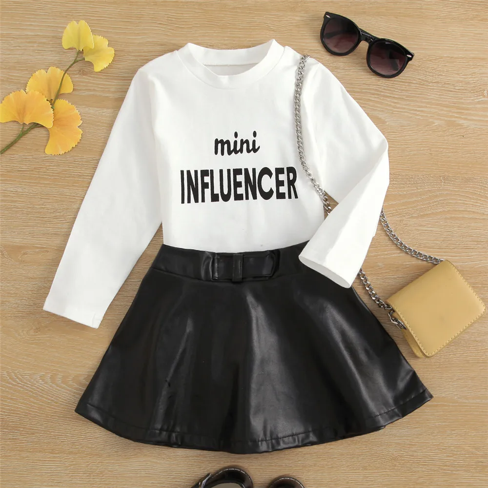 

2021 Autumn Baby Girls 2Pcs Skirt Set Letters Print Long Sleeve T-Shirt Pullover PU Leather Mini Skirt Suit For Toddlers Kids