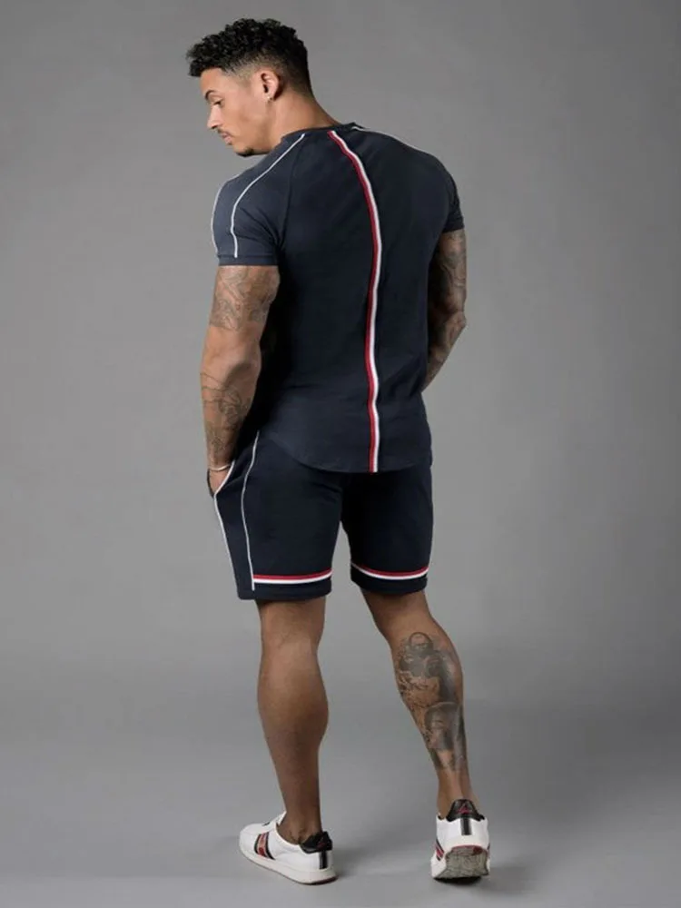 

2021 foreign trade new sports leisure men's short sleeve suit solid color matching men's two piece suit