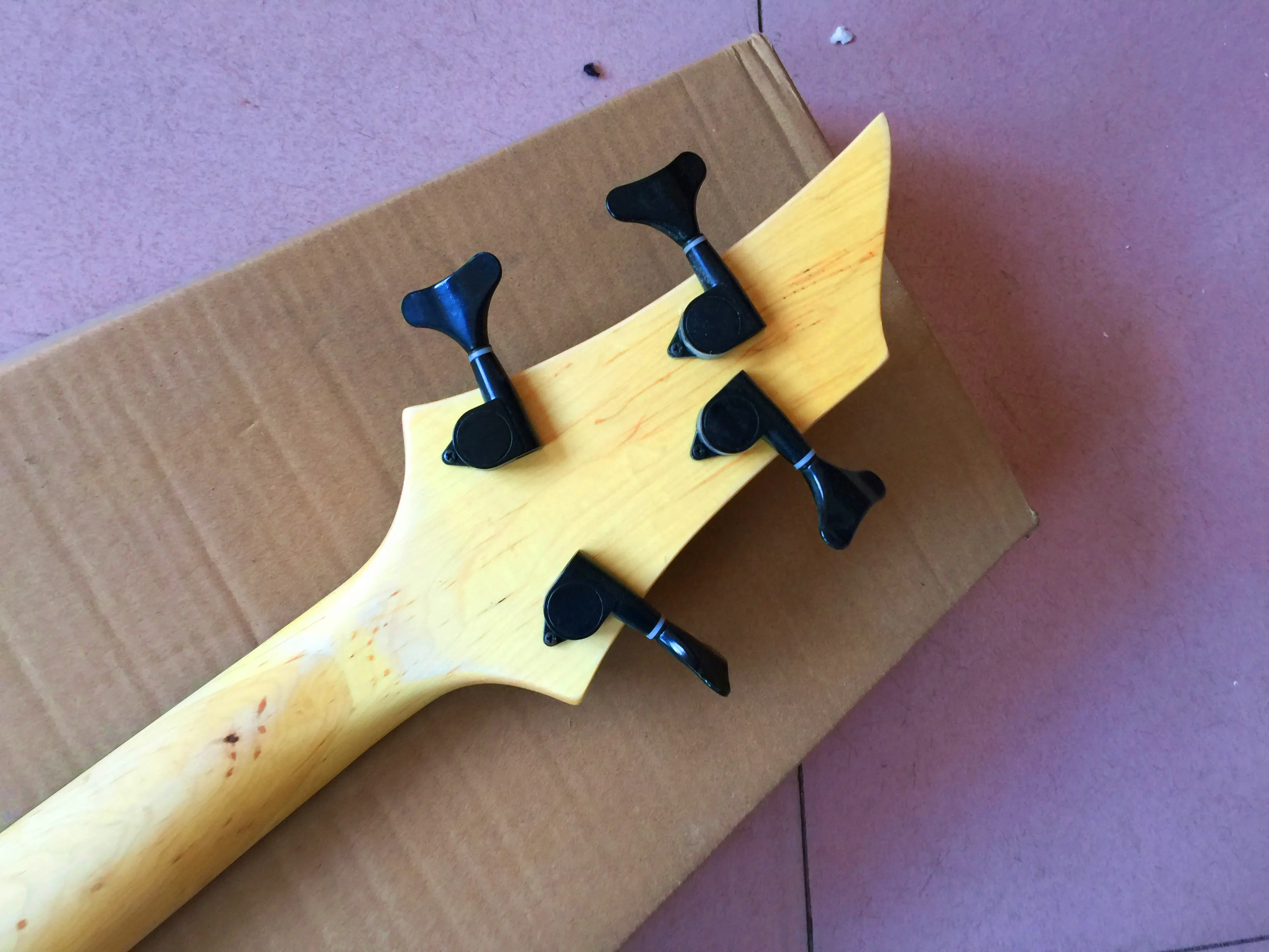 

new black 4 strings electric bass guitar , Chinese factory high quality bass , fire inlays fingerboars , free shipping